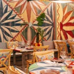 Restaurant interior decorated with the Dolce & Gabbana signature DG Carretto motif