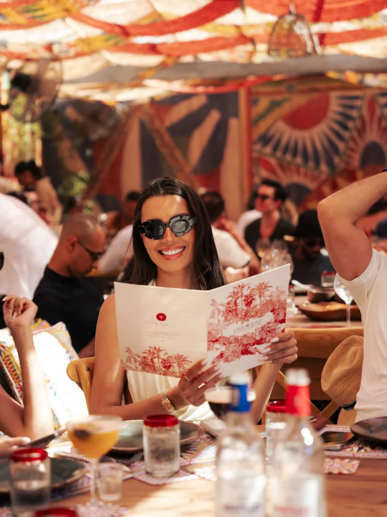 Guest enjoying the Dolce & Gabbana themed dining experience at Casa Amor Saint-Tropez