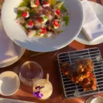 Sushi chef preparing Japanese cuisine at Kinugawa Ramatuelle