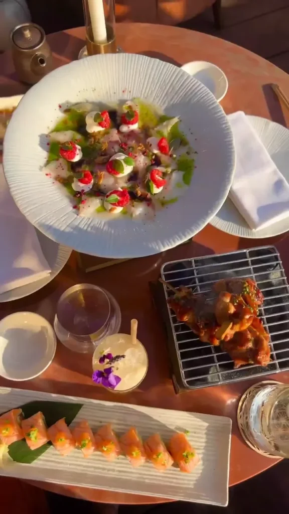 Sushi chef preparing Japanese cuisine at Kinugawa Ramatuelle