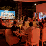 Guests enjoying dinner during an evening event at La Opera Saint-Tropez
