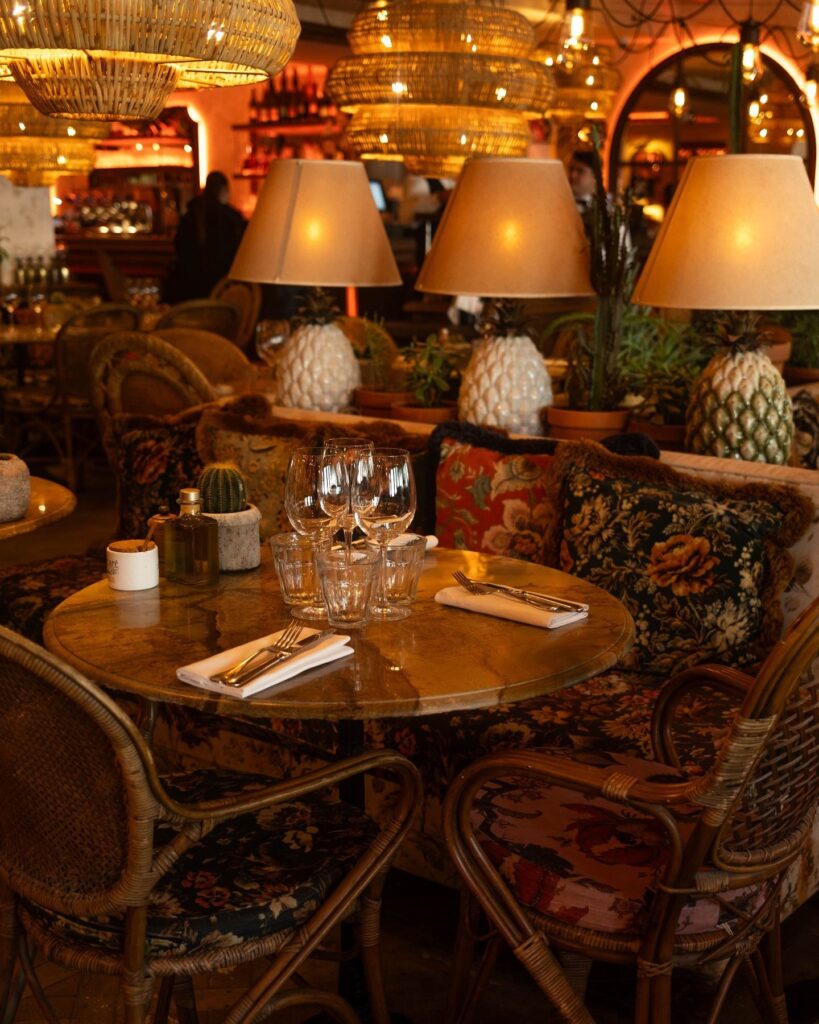Cozy lounge seating area at Le Café Saint-Tropez