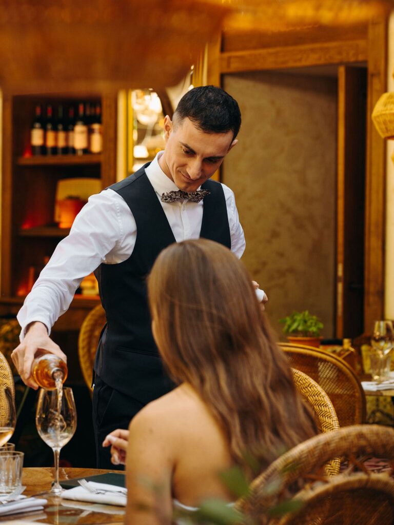 Professional table service at Le Café Saint-Tropez