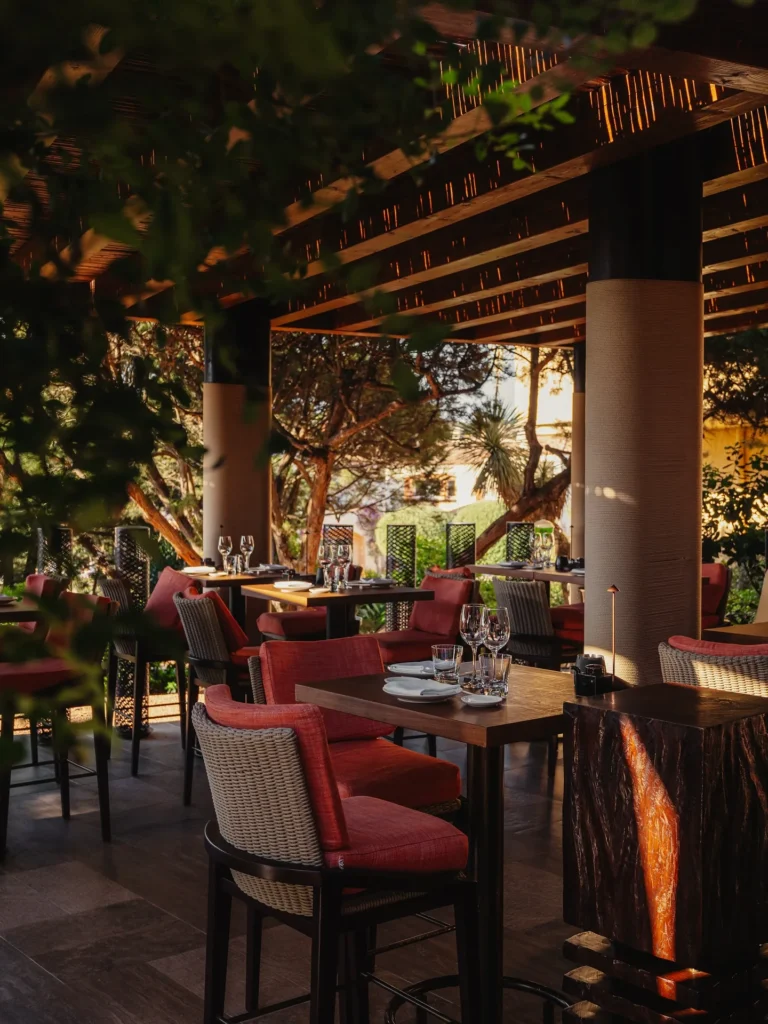 Guests enjoying sunset dining on the terrace at Zuma Porto Cervo