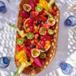 Large platter of tropical fruit and berries served at Byblos Beach Ramatuelle