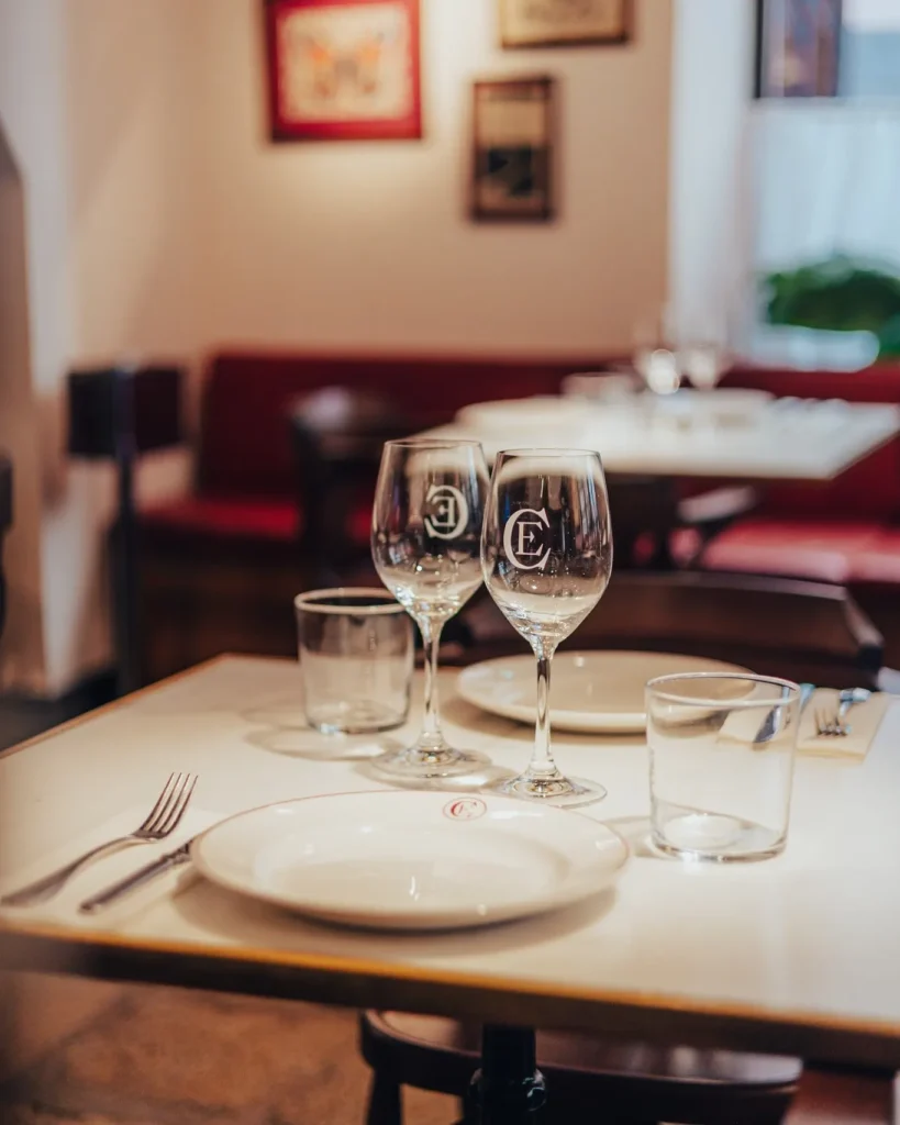 Marble table set with monogrammed glassware and plates at El Caminito Palma