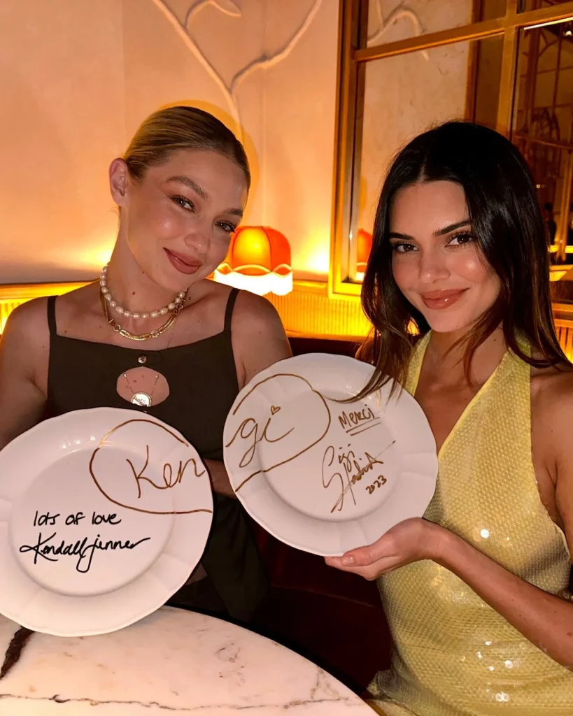 Gigi Hadid and Kendall Jenner at Siena Paris restaurant in Paris