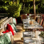 Outdoor dining area at Hôtel Lou Pinet Saint-Tropez