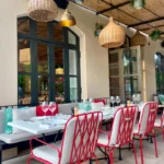 Outdoor restaurant terrace at Hôtel Lou Pinet Saint-Tropez