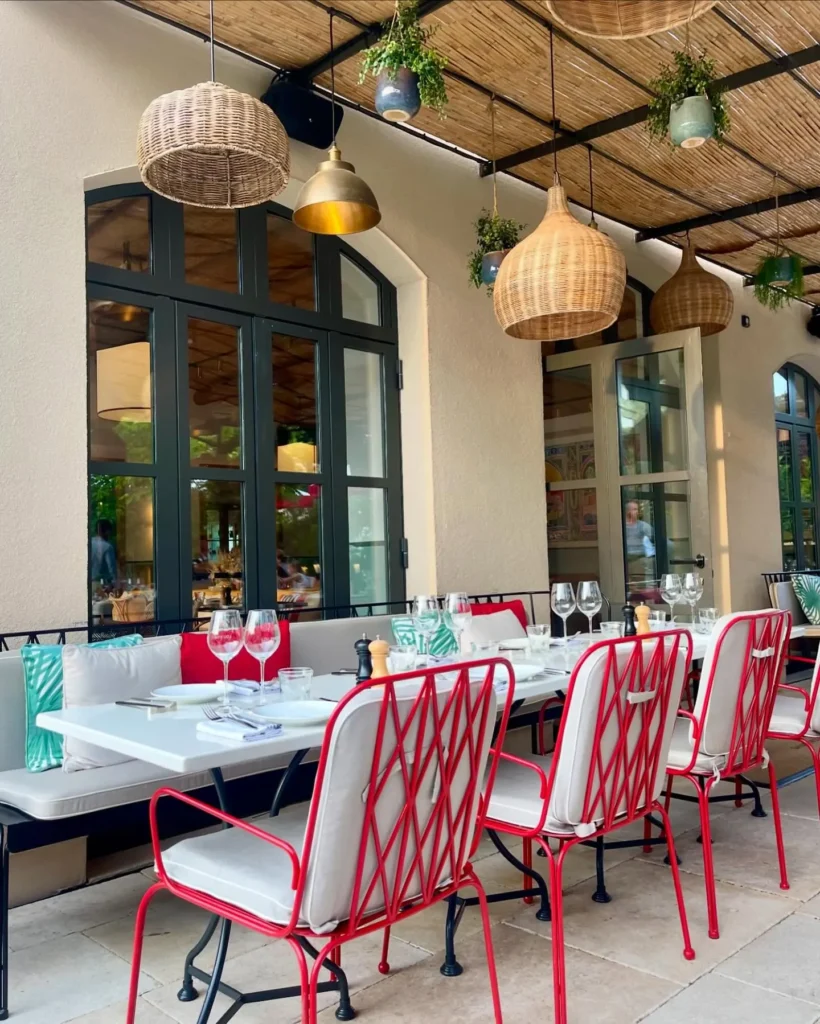 Outdoor restaurant terrace at Hôtel Lou Pinet Saint-Tropez