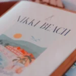 Illustrated Nikki Beach menu resting on a table at Nikki Beach Saint Barth