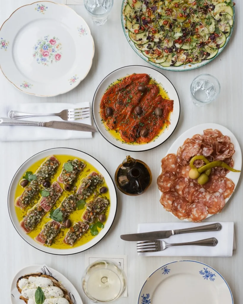 Spread of marinated tuna, roasted peppers, salami and courgette carpaccio at Rikito Palma