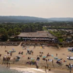 Aerial view of the beach club and busy shoreline at Shellona Saint-Tropez