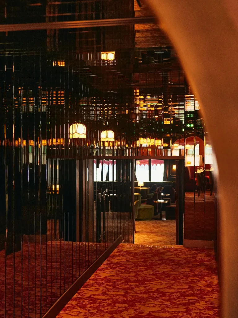 Sophisticated bar interior with warm lighting at Siena Paris