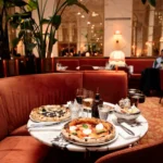 Italian dishes and table setting in the dining room at Siena Paris
