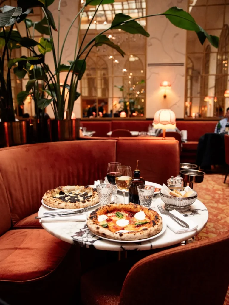 Italian dishes and table setting in the dining room at Siena Paris