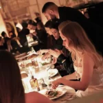 Guests enjoying an evening dining experience at Siena Paris