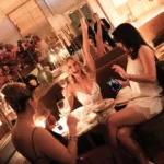Guests enjoying dinner and drinks inside Siena Paris restaurant