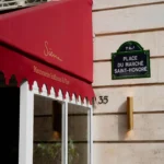 Exterior facade and red awning of Siena Paris restaurant