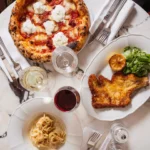 Italian pizza and dishes served at Siena Paris restaurant