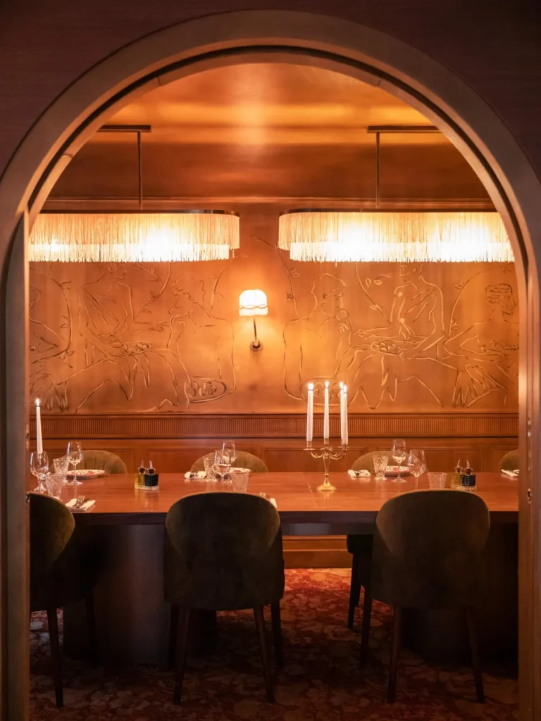 Intimate wood-paneled dining room at Siena Paris restaurant