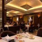 Elegant dining area with white tablecloths at Scott's Mayfair in London