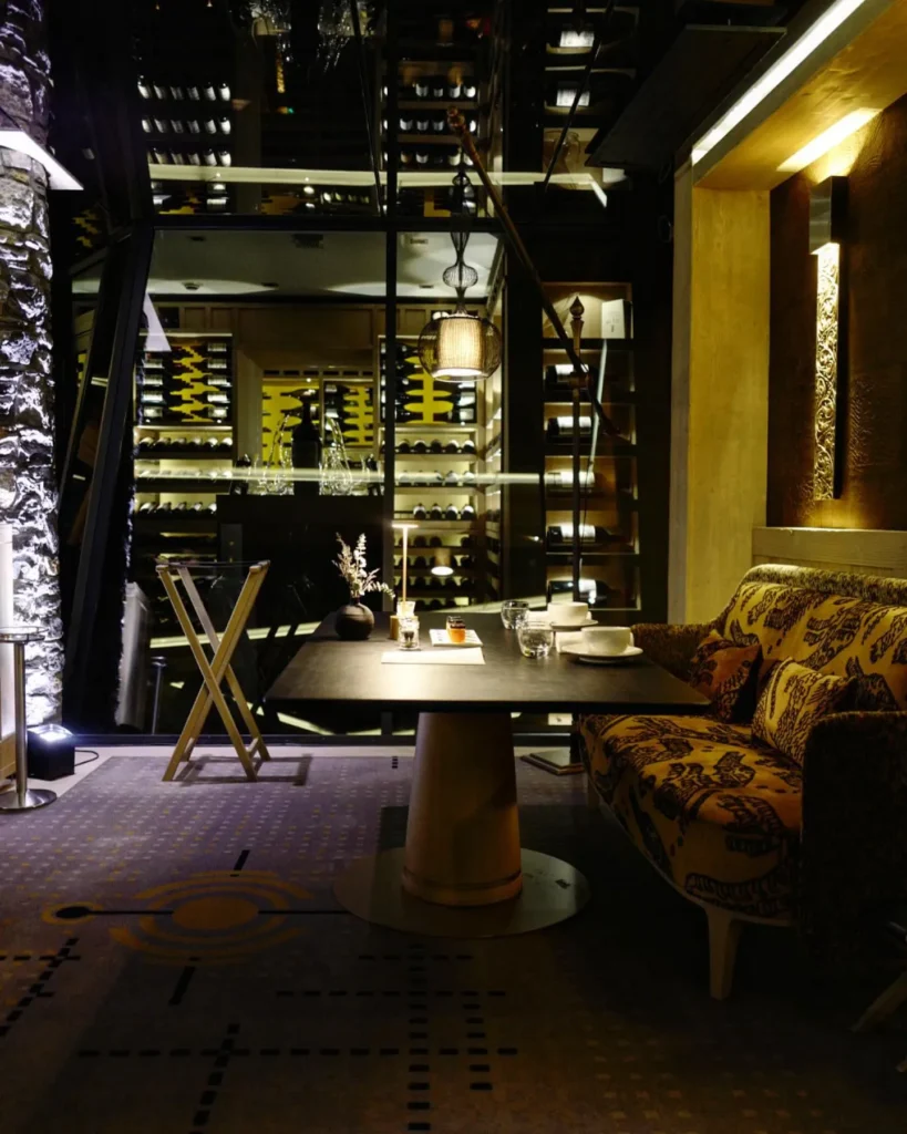 Evening exterior of L'Altiplano at K2 Palace Courchevel