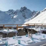 Mountain landscape and outdoor dining area at Bagatelle Courchevel