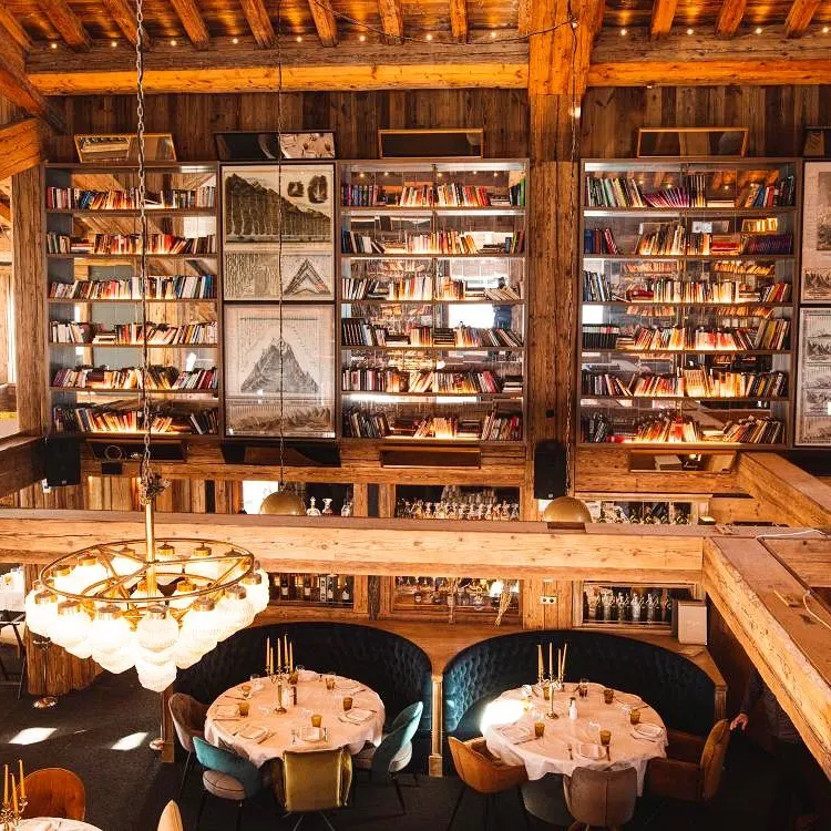 Wooden bar and lounge interior at Baïes Courchevel