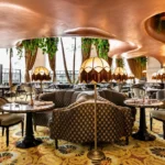 Elegant BeauCoCo Paris dining room with lush botanical decor