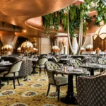 Luxurious restaurant interior with patterned seating at BeauCoCo Paris