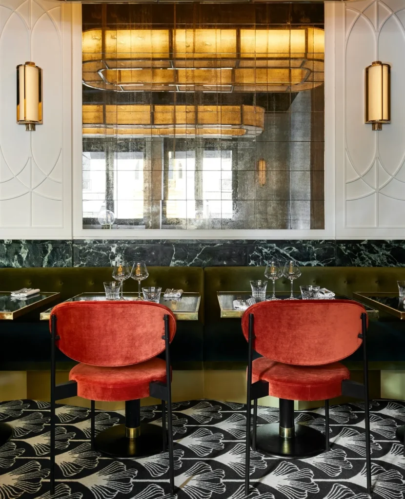 Elegant dining booth with marble details at Beefbar Paris