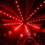 Dramatic red ceiling lights illuminating Boum Boum Paris nightclub