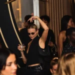 Guests enjoying the elegant nightclub interior at Boum Boum Paris