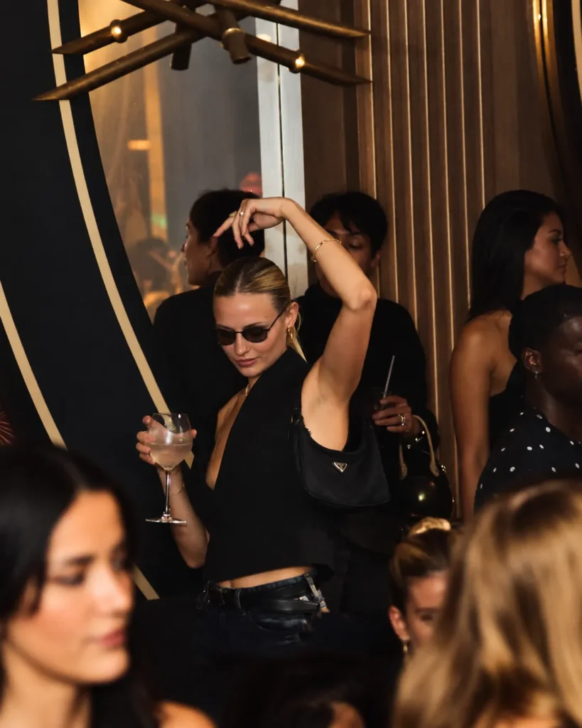 Guests enjoying the elegant nightclub interior at Boum Boum Paris