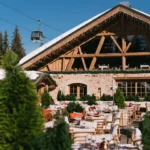 Alpine chalet exterior and outdoor terrace at Chalet de Pierres Courchevel