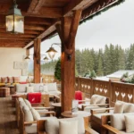 Covered outdoor seating area at Chalet de Pierres Courchevel