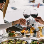 Gourmet dishes and wine served at Chalet de Pierres Courchevel