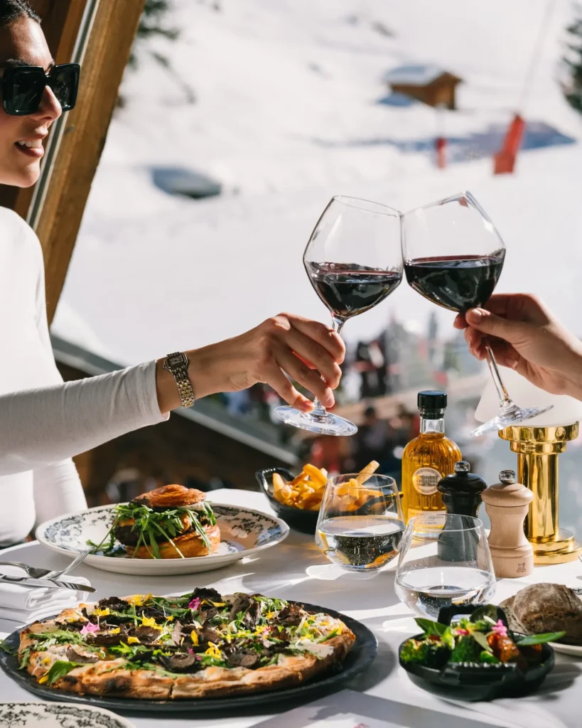 Gourmet dishes and wine served at Chalet de Pierres Courchevel