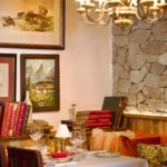 Elegant lounge and dining area inside Chalet de Pierres Courchevel