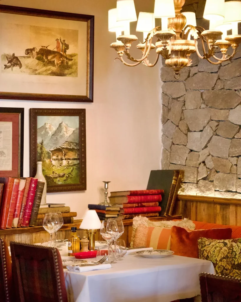 Elegant lounge and dining area inside Chalet de Pierres Courchevel