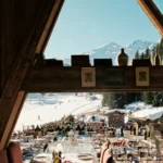 Dining terrace overlooking snowy mountains at Chalet de Pierres Courchevel