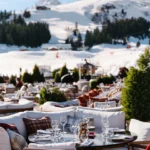 Outdoor dining terrace overlooking the alpine landscape at Chalet de Pierres