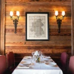 Elegant private dining table inside Chalet de Pierres Courchevel