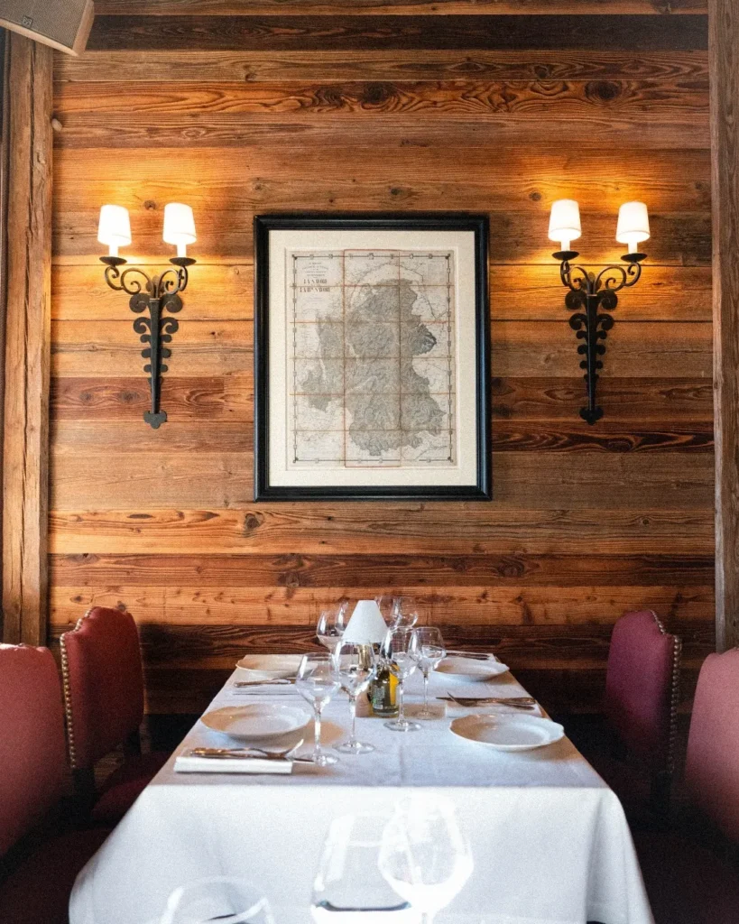 Elegant private dining table inside Chalet de Pierres Courchevel