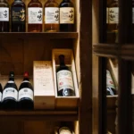 Wine bottles displayed in the cellar at Chalet de Pierres Courchevel