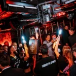 DJ performing for a crowd at Deflower Paris nightclub