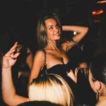 Guest enjoying the nightlife atmosphere at Deflower Paris