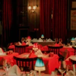Red-lit dining room at El Porteño Prohibido
