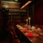 Candlelit dining room at El Porteño Prohibido